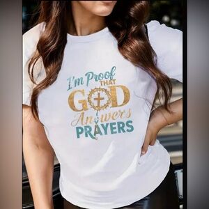 White Graphic Tee with Gold and Green Text-I’m Proof God Answers Prayers